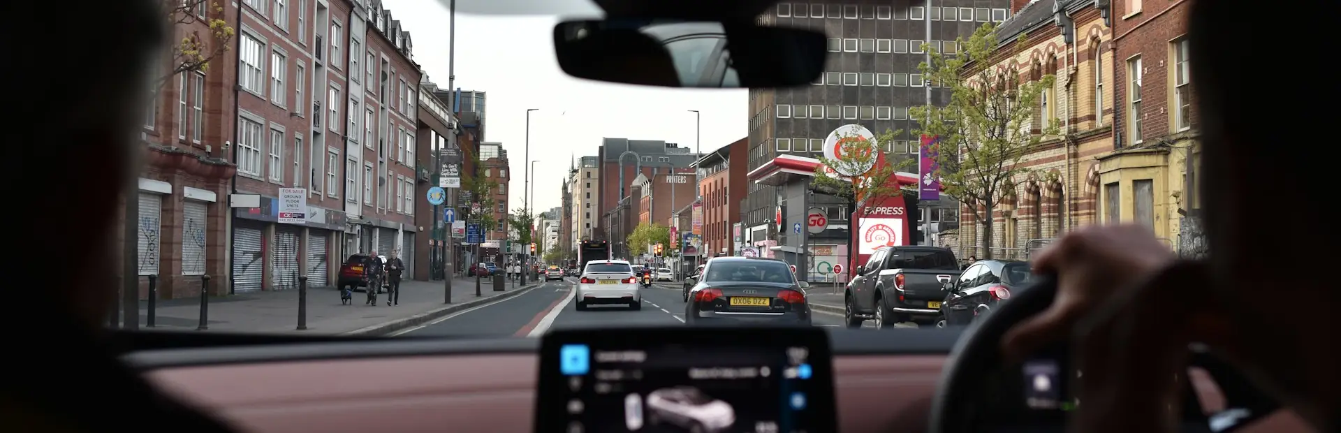 Inside car looking out to road in front