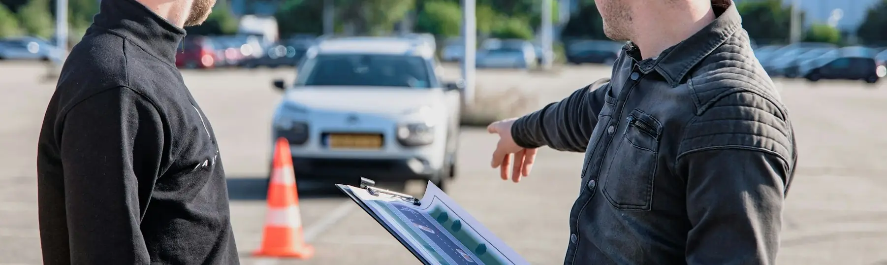 driving instructor teaching outside