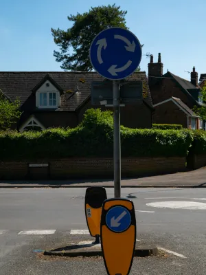 mini roundabout sign in road